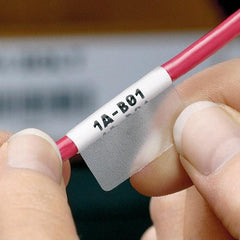 Panduit - 1-1/4" Wide x 1" Long, Clear/White Vinyl Cartridge For Self-Laminating Labels - For LS8EQ, LS8E, Hand-Held Thermal Transfer Printer - Apex Tool & Supply