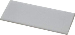 Norton - 4" Long x 1-3/4" Diam x 3/8" Thick, Novaculite Sharpening Stone - Round, Ultra Fine Grade - Apex Tool & Supply