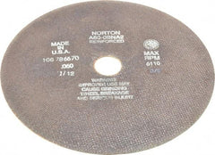 Norton - 10" 60 Grit Aluminum Oxide Cutoff Wheel - 0.06" Thick, 1-1/4" Arbor, 6,110 Max RPM, Use with Stationary Grinders - Apex Tool & Supply