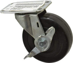 E.R. Wagner - 4" Diam x 1-1/4" Wide x 4-11/16" OAH Top Plate Mount Swivel Caster with Brake - Soft Rubber, 165 Lb Capacity, Delrin Bearing, 2-3/4 x 3-3/4" Plate - Apex Tool & Supply