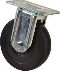 E.R. Wagner - 5" Diam x 1-3/8" Wide x 6-1/16" OAH Top Plate Mount Rigid Caster - Soft Rubber, 240 Lb Capacity, Delrin Bearing, 3-1/8 x 4-1/8" Plate - Apex Tool & Supply