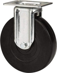 E.R. Wagner - 6" Diam x 1-3/8" Wide x 7-1/16" OAH Top Plate Mount Rigid Caster - Soft Rubber, 280 Lb Capacity, Delrin Bearing, 3-1/8 x 4-1/8" Plate - Apex Tool & Supply