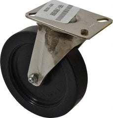 E.R. Wagner - 6" Diam x 1-3/8" Wide x 7-3/8" OAH Top Plate Mount Swivel Caster - Polyolefin, 450 Lb Capacity, Delrin Bearing, 3-1/8 x 4-1/8" Plate - Apex Tool & Supply