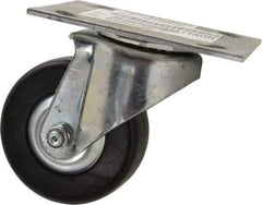 E.R. Wagner - 3-1/2" Diam x 1-1/4" Wide x 4-5/8" OAH Top Plate Mount Swivel Caster - Hard Rubber, 250 Lb Capacity, Delrin Bearing, 3-3/4 x 4-5/8" Plate - Apex Tool & Supply