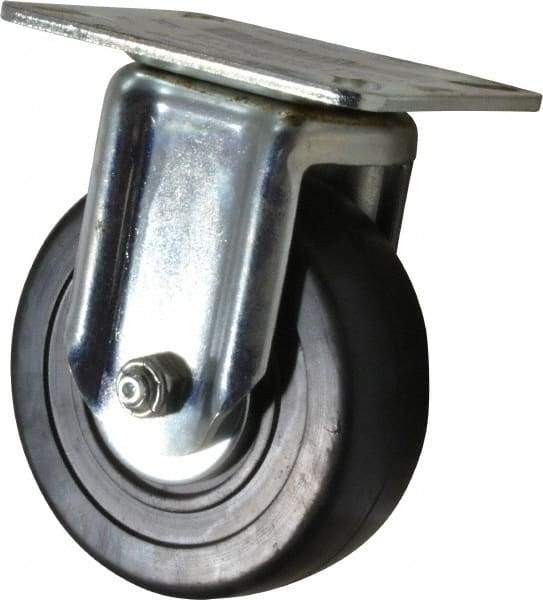 E.R. Wagner - 4" Diam x 1-3/8" Wide x 5-1/16" OAH Top Plate Mount Rigid Caster - Soft Rubber, 200 Lb Capacity, Delrin Bearing, 3-1/8 x 4-1/8" Plate - Apex Tool & Supply