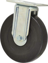 E.R. Wagner - 6" Diam x 1-3/8" Wide x 7-1/16" OAH Top Plate Mount Rigid Caster - Soft Rubber, 280 Lb Capacity, Delrin Bearing, 3-1/8 x 4-1/8" Plate - Apex Tool & Supply
