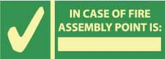 NMC - In Case of Fire - Assembly Point Is: _______, Pressure Sensitive Vinyl Exit Sign - 14" Wide x 5" High, Glow-in-the-Dark - Apex Tool & Supply