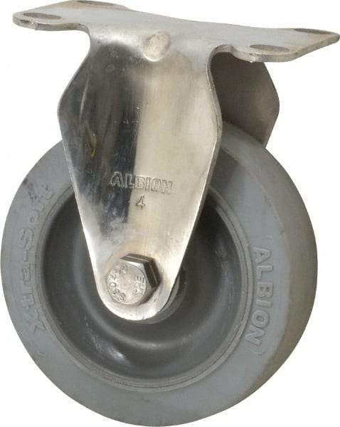 Albion - 4" Diam x 1-1/4" Wide x 5-1/8" OAH Top Plate Mount Rigid Caster - Soft Rubber, 410 Lb Capacity, Delrin Bearing, 2-1/2 x 3-5/8" Plate - Apex Tool & Supply