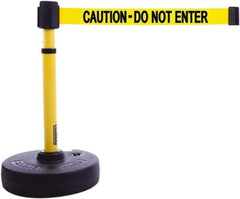 Banner Stakes - 22 to 42" High, 2-3/8" Pole Diam, Barrier Post Base & Stanchion - 9" Base Diam, Round Nylon Base, Yellow Plastic Post, 15' x 2-1/2" Tape, For Outdoor Use - Apex Tool & Supply