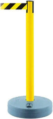 Tensator - 38" High, 2-1/2" Pole Diam, Barricade Tape Dispenser - 14" Base Diam, Round Plastic Base, Yellow Polymer Post, 7-1/2' x 1-7/8" Tape, Single Line Tape, For Outdoor Use - Apex Tool & Supply