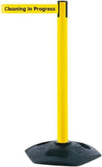 Tensator - 38" High, 2-1/2" Pole Diam, Barricade Tape Dispenser - 14" Base Diam, Round Rubber Base, Yellow Polymer Post, 7-1/2' x 1-7/8" Tape, Single Line Tape, For Outdoor Use - Apex Tool & Supply