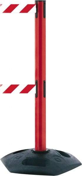 Tensator - 38" High, 2-1/2" Pole Diam, 4 Way Stanchion - 19" Base Diam, Octagon Recycled Rubber Base, Red Plastic Post, 7-1/2' x 2" Tape, Dual Line Tape, For Outdoor Use - Apex Tool & Supply