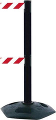 Tensator - 38" High, 2-1/2" Pole Diam, 4 Way Stanchion - 19" Base Diam, Octagon Recycled Rubber Base, Black Plastic Post, 7-1/2' x 2" Tape, Dual Line Tape, For Outdoor Use - Apex Tool & Supply