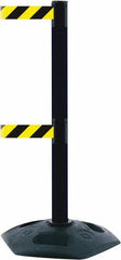 Tensator - 38" High, 2-1/2" Pole Diam, 4 Way Stanchion - 19" Base Diam, Octagon Recycled Rubber Base, Black Plastic Post, 13' x 2" Tape, Dual Line Tape, For Outdoor Use - Apex Tool & Supply