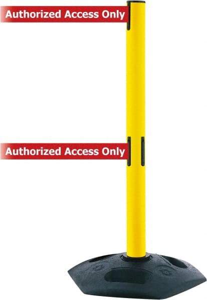 Tensator - 38" High, 2-1/2" Pole Diam, 4 Way Stanchion - 19" Base Diam, Octagon Recycled Rubber Base, Yellow Plastic Post, 7-1/2' x 2" Tape, Dual Line Tape, For Outdoor Use - Apex Tool & Supply