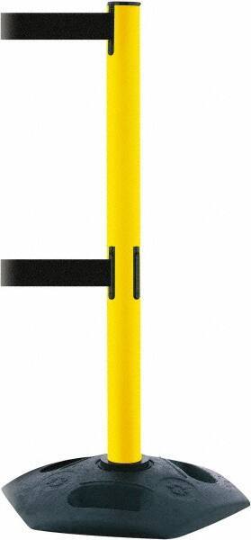 Tensator - 38" High, 2-1/2" Pole Diam, 4 Way Stanchion - 19" Base Diam, Octagon Recycled Rubber Base, Yellow Plastic Post, 7-1/2' x 2" Tape, Dual Line Tape, For Outdoor Use - Apex Tool & Supply