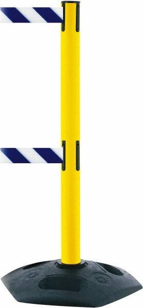 Tensator - 38" High, 2-1/2" Pole Diam, 4 Way Stanchion - 19" Base Diam, Octagon Recycled Rubber Base, Yellow Plastic Post, 7-1/2' x 2" Tape, Dual Line Tape, For Outdoor Use - Apex Tool & Supply