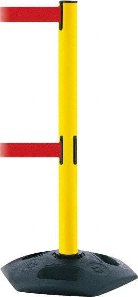 Tensator - 38" High, 2-1/2" Pole Diam, 4 Way Stanchion - 19" Base Diam, Octagon Recycled Rubber Base, Yellow Plastic Post, 13' x 2" Tape, Dual Line Tape, For Outdoor Use - Apex Tool & Supply