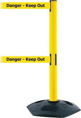 Tensator - 38" High, 2-1/2" Pole Diam, 4 Way Stanchion - 19" Base Diam, Octagon Recycled Rubber Base, Yellow Plastic Post, 13' x 2" Tape, Dual Line Tape, For Outdoor Use - Apex Tool & Supply