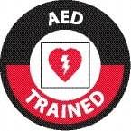 NMC - AED Trained, Hard Hat Label - Round, White & Red on Black, 0.004" Thick, Indoor or Outdoor, Adhesive Backed, For Accident Prevention - Apex Tool & Supply