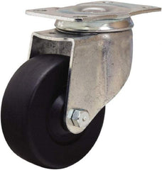 Hamilton - 3-1/2" Diam x 1-1/4" Wide x 4-13/16" OAH Top Plate Mount Swivel Caster - Hard Rubber, 140 Lb Capacity, Self-Lubricating Bearing, 2-1/2 x 3-3/4" Plate - Apex Tool & Supply