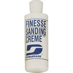 Dynabrade - 4 oz Sanding Creme Compound - Compound Grade Fine, White, For High Glossing, Use on Composites, Fiberglass & Metal - Apex Tool & Supply