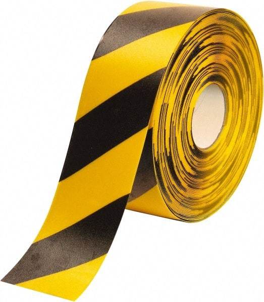 PRO-SAFE - Black & Yellow Striped PVC Tape - 4" Wide x 100' Long x 50 mil Thick, General Traffic - Apex Tool & Supply