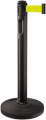 Lavi Industries - 38-1/4" High, 3-1/4" Pole Diam, Stanchion - 16" Base Diam, Dome Recycled Rubber Base, Black Plastic Post, 12' x 2" Tape, Single Line Tape, For Outdoor Use - Apex Tool & Supply