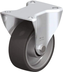 Blickle - 4" Diam x 1-37/64" Wide x 4-59/64" OAH Top Plate Mount Rigid Caster - Silicone Rubber, 220 Lb Capacity, Plain Bore Bearing, 3-15/16 x 3-3/8" Plate - Apex Tool & Supply