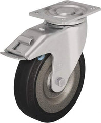 Blickle - 6-1/2" Diam x 1-31/32" Wide x 7-61/64" OAH Top Plate Mount Swivel Caster with Brake - Solid Rubber, 990 Lb Capacity, Ball Bearing, 5-1/2 x 4-3/8" Plate - Apex Tool & Supply