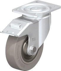 Blickle - 6-1/2" Diam x 1-31/32" Wide x 7-61/64" OAH Top Plate Mount Swivel Caster with Brake - Solid Rubber, 990 Lb Capacity, Ball Bearing, 5-1/2 x 4-3/8" Plate - Apex Tool & Supply