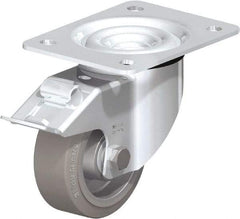 Blickle - 4" Diam x 1-37/64" Wide x 5-7/64" OAH Top Plate Mount Swivel Caster with Brake - Solid Rubber, 440 Lb Capacity, Ball Bearing, 5-1/2 x 4-3/8" Plate - Apex Tool & Supply