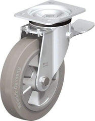 Blickle - 8" Diam x 1-31/32" Wide x 9-41/64" OAH Top Plate Mount Swivel Caster with Brake - Solid Rubber, 1,100 Lb Capacity, Ball Bearing, 5-1/2 x 4-3/8" Plate - Apex Tool & Supply