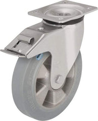 Blickle - 6-1/2" Diam x 1-31/32" Wide x 7-61/64" OAH Top Plate Mount Swivel Caster with Brake - Solid Rubber, 880 Lb Capacity, Ball Bearing, 5-1/2 x 4-3/8" Plate - Apex Tool & Supply