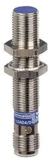 Telemecanique Sensors - NPN, 4mm Detection, Cylinder Shielded, Inductive Proximity Sensor - 3 Wires, IP67, IP69K, 12 to 48 VDC, M12x1 Thread, 2.44 Inch Long - Apex Tool & Supply