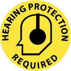 NMC - Hearing Protection Required, Anti-Skid Pressure-Sensitive Vinyl Floor Sign - Round, Black on Yellow, Adhesive Backed, For Accident Prevention - Apex Tool & Supply