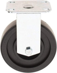 E.R. Wagner - 5" Diam x 1-1/4" Wide x 6-1/4" OAH Top Plate Mount Rigid Caster - Polyolefin, 450 Lb Capacity, Delrin Bearing, 2-3/4 x 3-3/4" Plate - Apex Tool & Supply