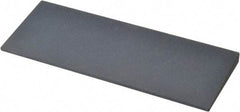 Norton - 4-1/2" Long x 1-3/4" Diam x 1/4" Thick, Silicon Carbide Sharpening Stone - Round, Fine Grade - Apex Tool & Supply
