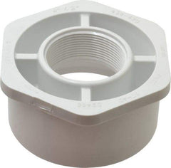 Value Collection - 4 x 2" PVC Plastic Pipe Bushing - Schedule 40, Spig x FIPT End Connections - Apex Tool & Supply