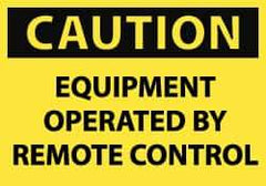 NMC - Accident Prevention Label, Header: CAUTION - Legend: Caution - Equipment Operated by Remote Control, English, Black & Yellow, 5" Long x 3" High, Sign Muscle Finish - Apex Tool & Supply