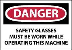 NMC - Accident Prevention Label, Header: DANGER - Legend: Danger - Safety Glasses Must Be Worn While Operating This Machine, English, Red, Black & White, 5" Long x 3" High, Sign Muscle Finish - Apex Tool & Supply