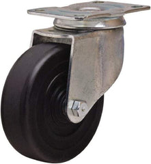 Hamilton - 4" Diam x 1-1/4" Wide x 5" OAH Top Plate Mount Swivel Caster - Hard Rubber, 165 Lb Capacity, Self-Lubricating Bearing, 2-1/2 x 3-3/4" Plate - Apex Tool & Supply