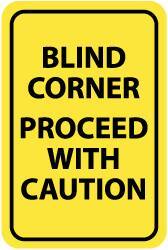 NMC - "Blind Corner - Proceed with Caution", 12" Wide x 18" High, Aluminum Warning & Safety Reminder Signs - 0.063" Thick, Black on Yellow, Rectangle, Post Mount - Apex Tool & Supply