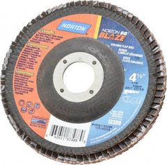 Norton - 60 Grit, 4-1/2" Disc Diam, 7/8" Center Hole, Type 29 Ceramic Flap Disc - 13,000 Max RPM, Fiberglass Backing, Arbor Attaching System, Coated - Apex Tool & Supply